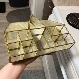 Glass and brass house